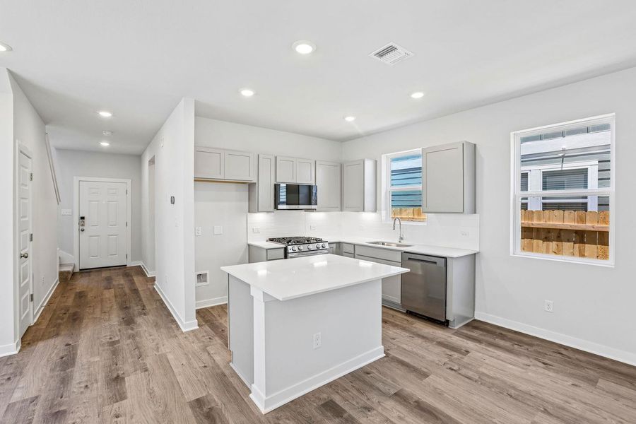 Furnished interior view inside a new home in Avery Centre, Round Rock (Image 6).