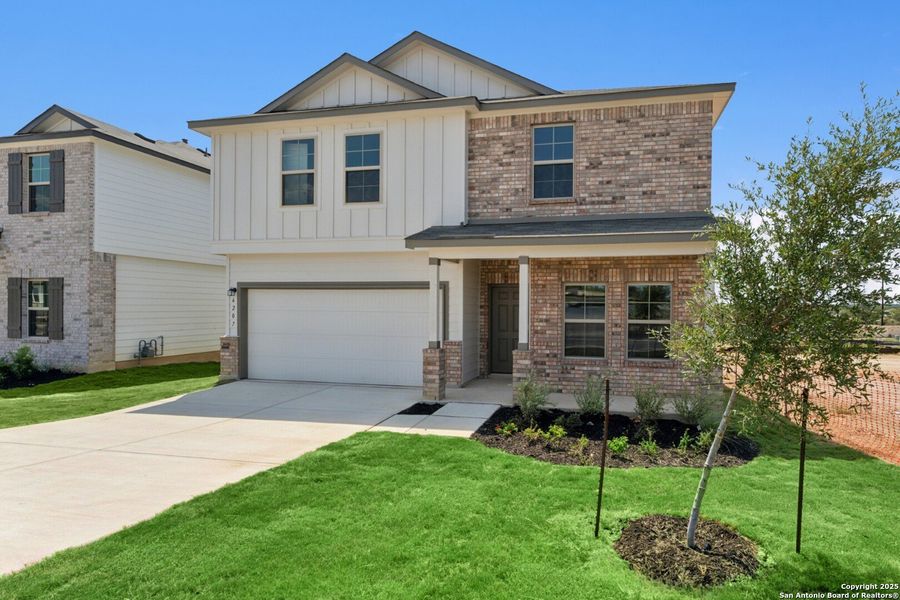 Front exterior of a new home in Mesquite Ridge, San Antonio, TX, highlighting curb appeal (Image 21). Front exterior of a new home in Mesquite Ridge, San Antonio, TX, highlighting curb appeal (Image 21).