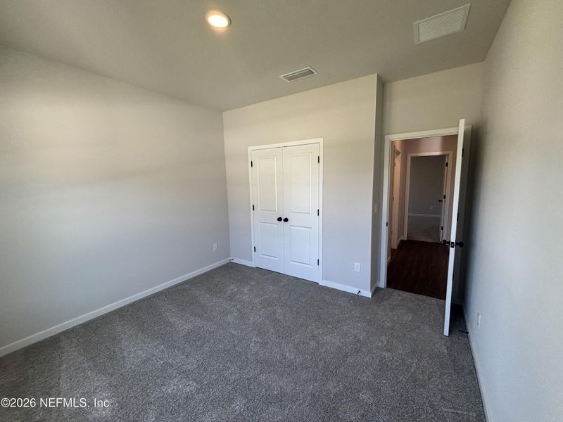 Spacious, unfurnished interior of a new home in Reserve East, Flagler Beach (Image 25).