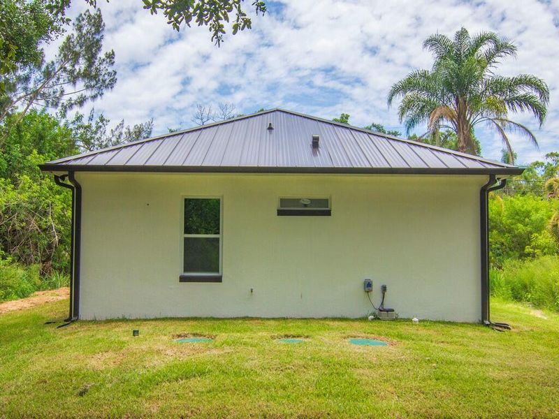 Exterior details and patio area of a home in , Vero Beach (Image 16). Exterior details and patio area of a home in , Vero Beach (Image 16).