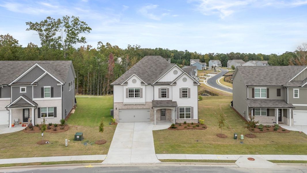 Representative exterior photo of a completed home built from the HALTON by D.R. Horton in Lost Creek, Dallas, GA (Image 25).