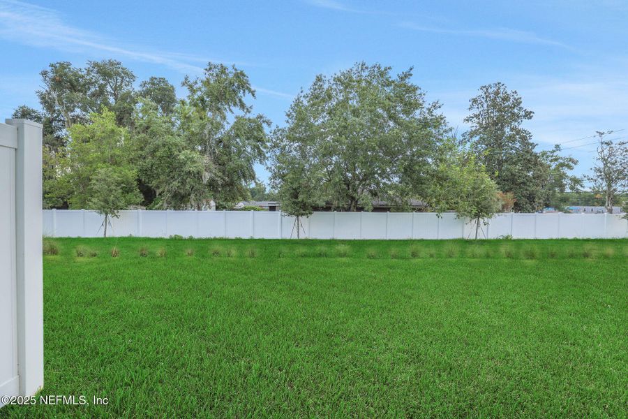 Front exterior of a new home in Kasen Oaks, Jacksonville, FL, highlighting curb appeal (Image 20).