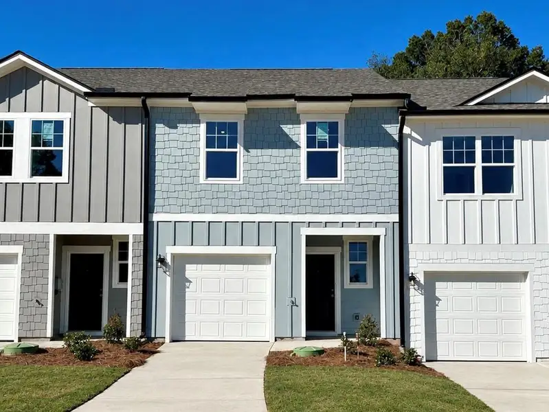 Front exterior of a new home in Villas at Cassville, Cartersville, GA, highlighting curb appeal (Image 1). Front exterior of a new home in Villas at Cassville, Cartersville, GA, highlighting curb appeal (Image 1).
