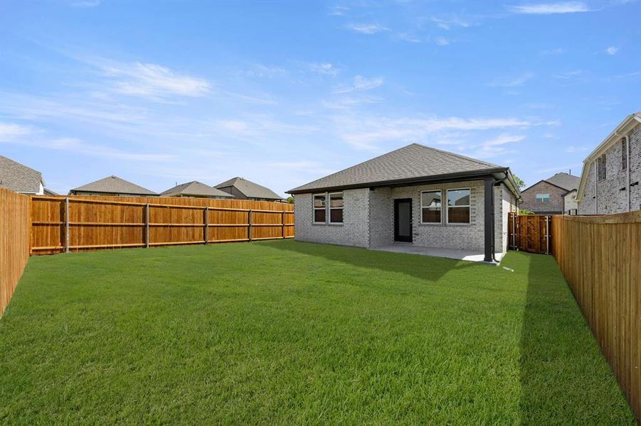 Exterior details and patio area of a home in Devonshire 40s, Forney (Image 19).