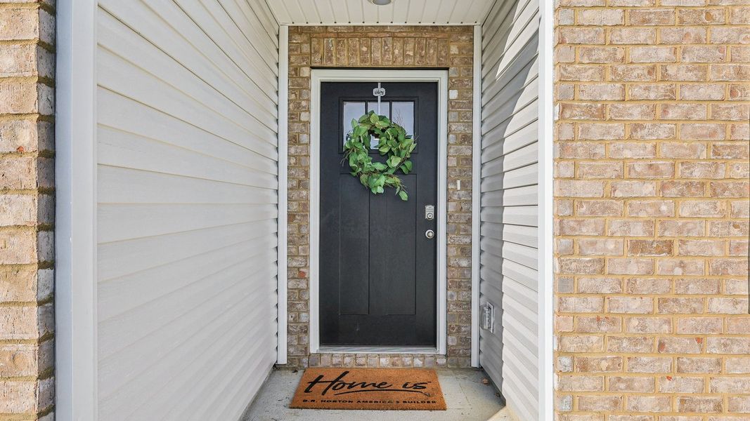 Exterior details and patio area of a home in The Parks, White House (Image 2). Exterior details and patio area of a home in The Parks, White House (Image 2).