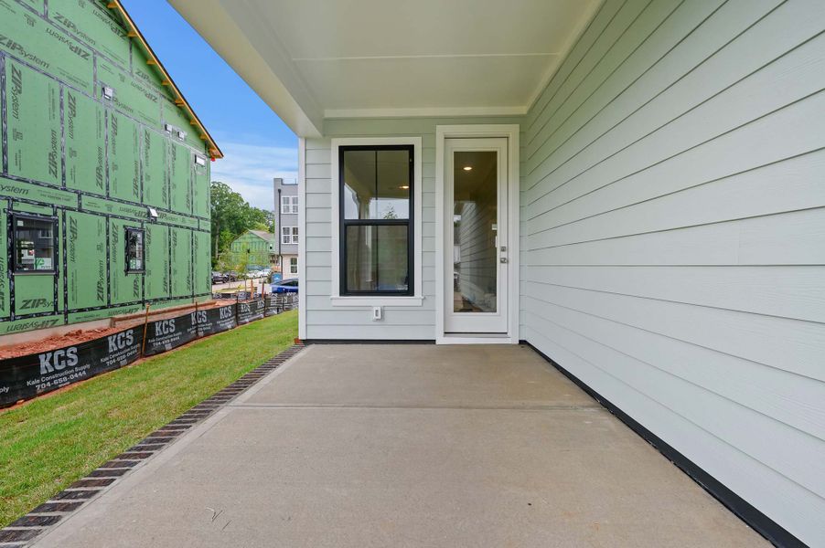 Representative exterior details of a home built from the The Warrington by David Weekley Homes in The River District - Pioneer Collection, Charlotte (Image 3).