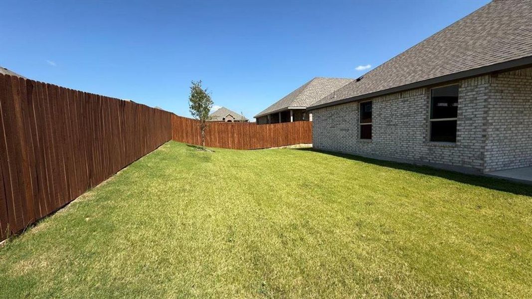 Exterior details and patio area of a home in Saratoga, Granbury (Image 2). Exterior details and patio area of a home in Saratoga, Granbury (Image 2).
