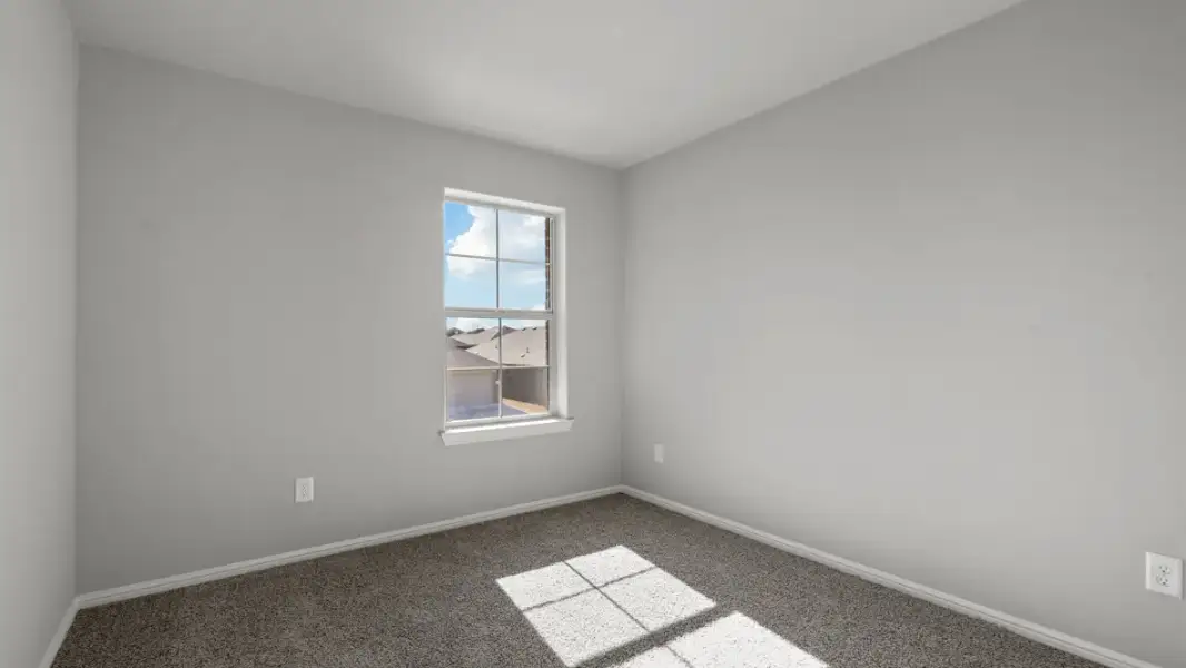 Representative unfurnished interior of a home built from the Midland by D.R. Horton in Audra Oaks, Denton (Image 40).