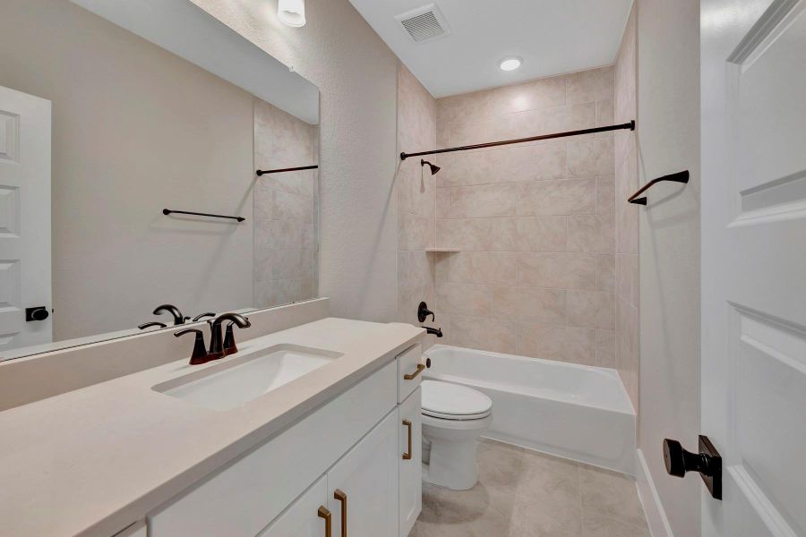 Furnished interior view inside a new home in Easthaven at Bridgeland Central - Vision Collection, Cypress (Image 11).