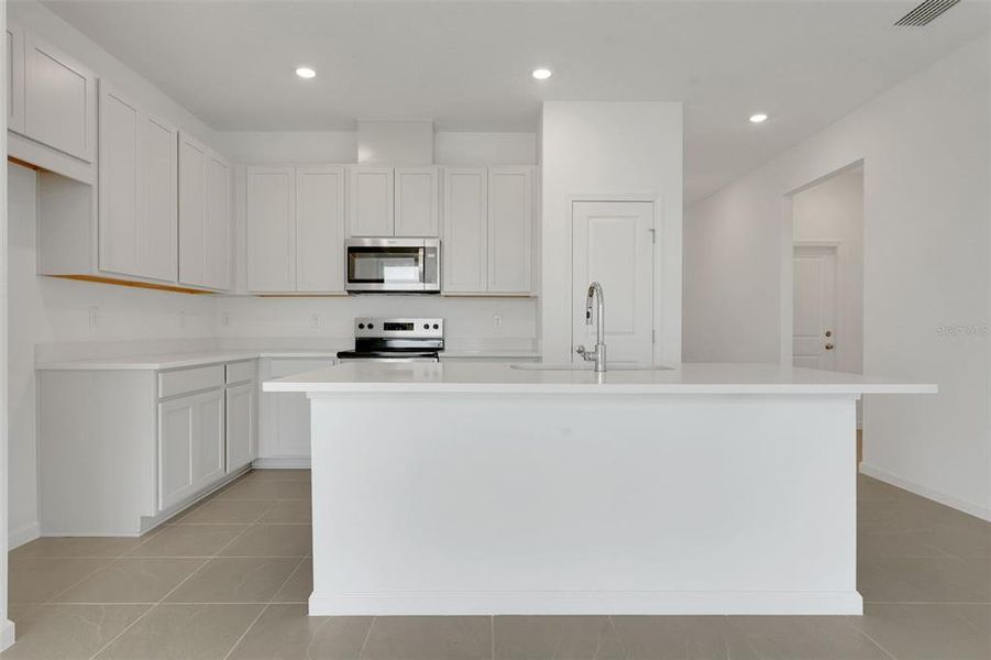 Furnished interior view inside a new home in Annabelle Estates, Winter Haven (Image 6).