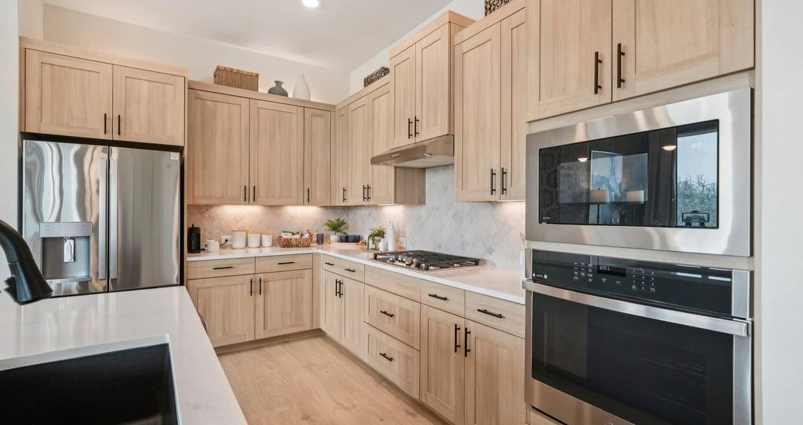 Furnished interior view inside a new home in Stream Waters, Seguin (Image 9).