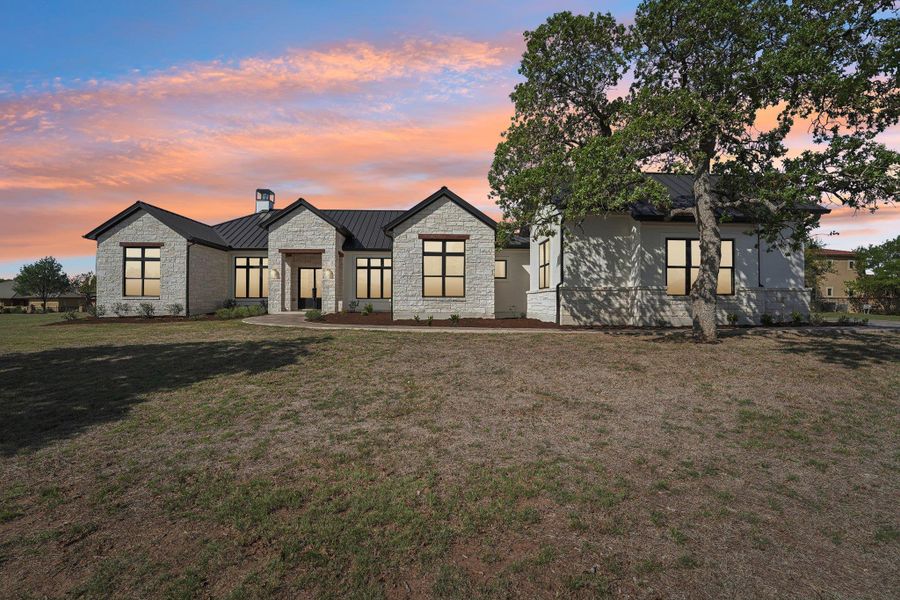 Golden hour in the Hill Country—this home glows inside and out. Golden hour in the Hill Country—this home glows inside and out.