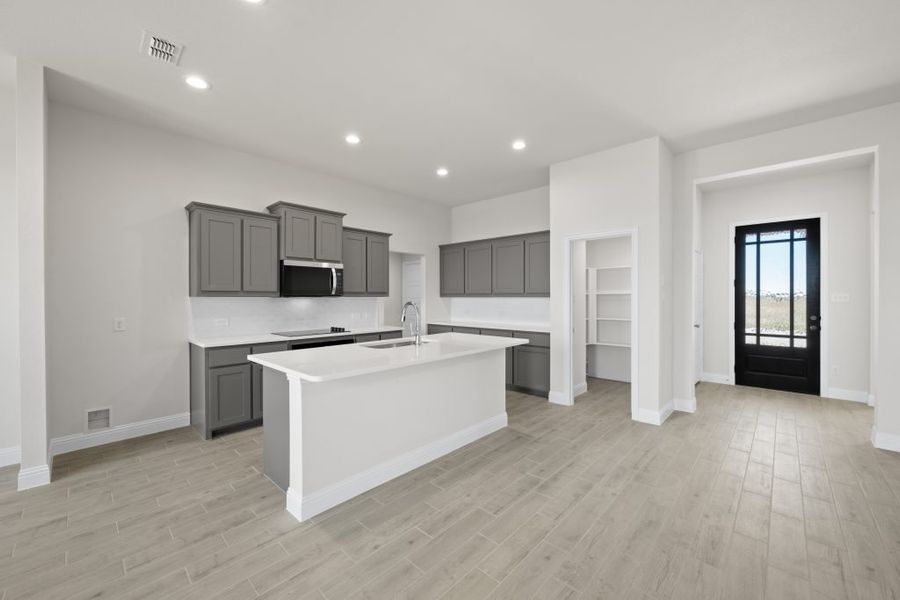 Front exterior of a new home in Still Water Lake, Godley, TX, highlighting curb appeal (Image 6). Front exterior of a new home in Still Water Lake, Godley, TX, highlighting curb appeal (Image 6).