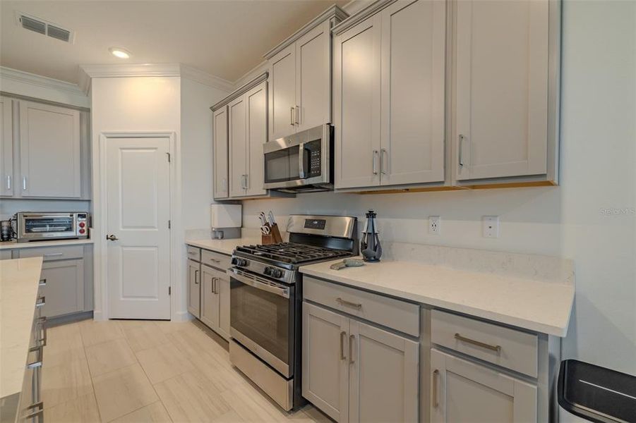 Furnished interior view inside a new home in Prosperity Lakes, Parrish (Image 9).
