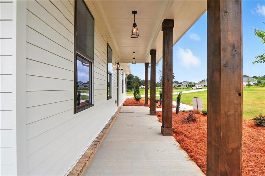 Exterior details and patio area of a home in Old Town Estates, Dacula (Image 40).