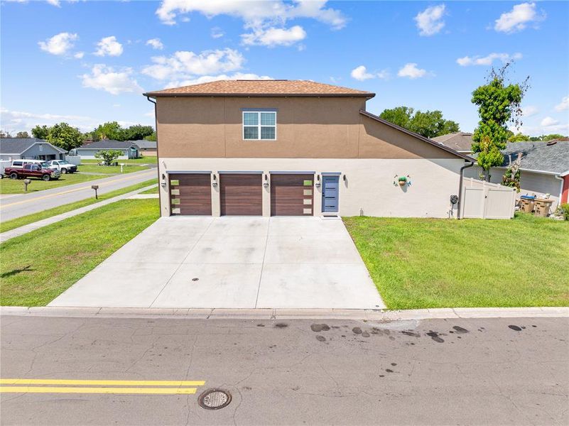 Front exterior of a new home in , Kissimmee, FL, highlighting curb appeal (Image 25). Front exterior of a new home in , Kissimmee, FL, highlighting curb appeal (Image 25).