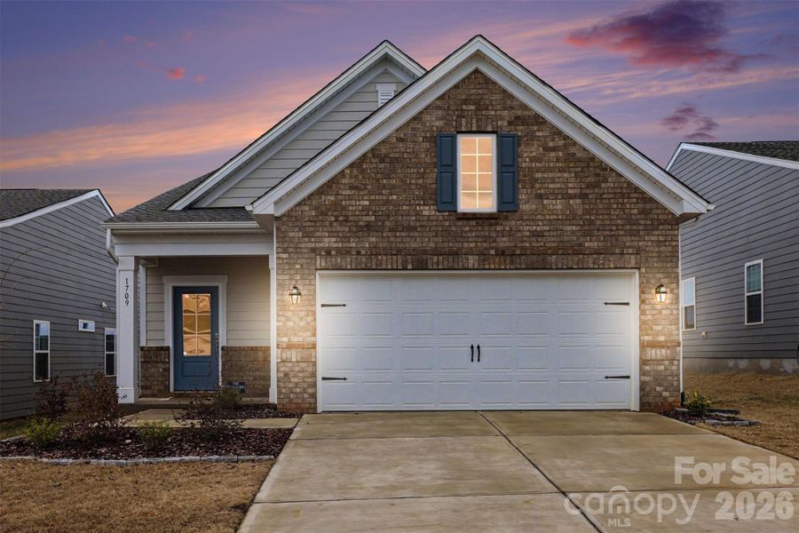 Front exterior of a new home in Elizabeth, Fort Mill, SC, highlighting curb appeal (Image 2). Front exterior of a new home in Elizabeth, Fort Mill, SC, highlighting curb appeal (Image 2).