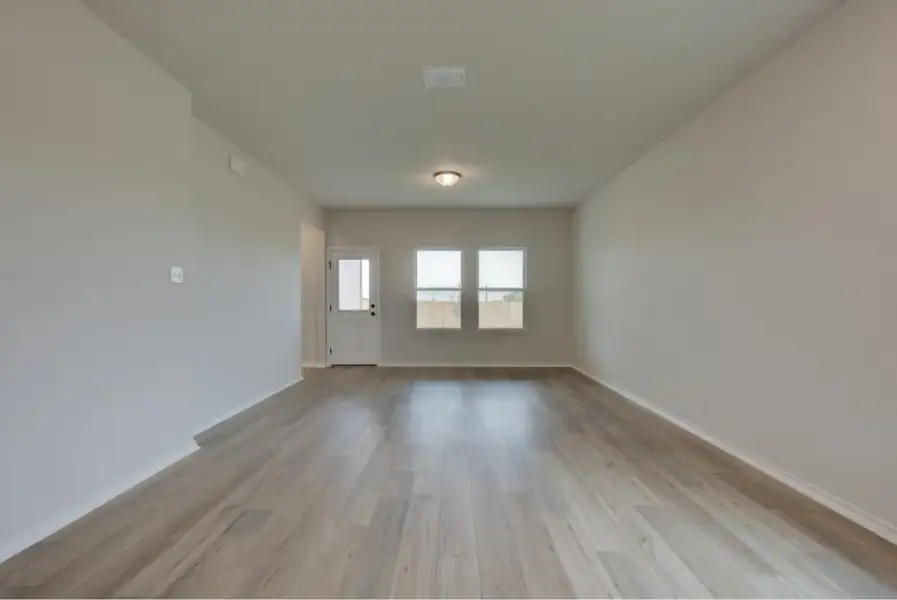 Representative unfurnished interior of a home built from the Brodie by Ashton Woods in Saddlebrook Ranch, Schertz (Image 11).