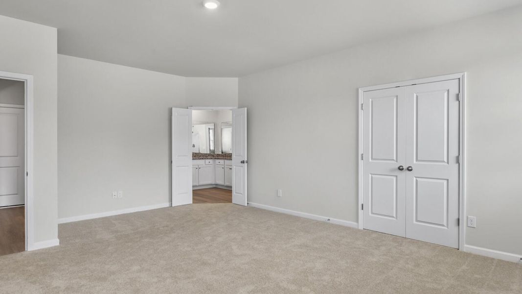 Spacious, unfurnished interior of a new home in Surfside Landing, Hubert (Image 20).