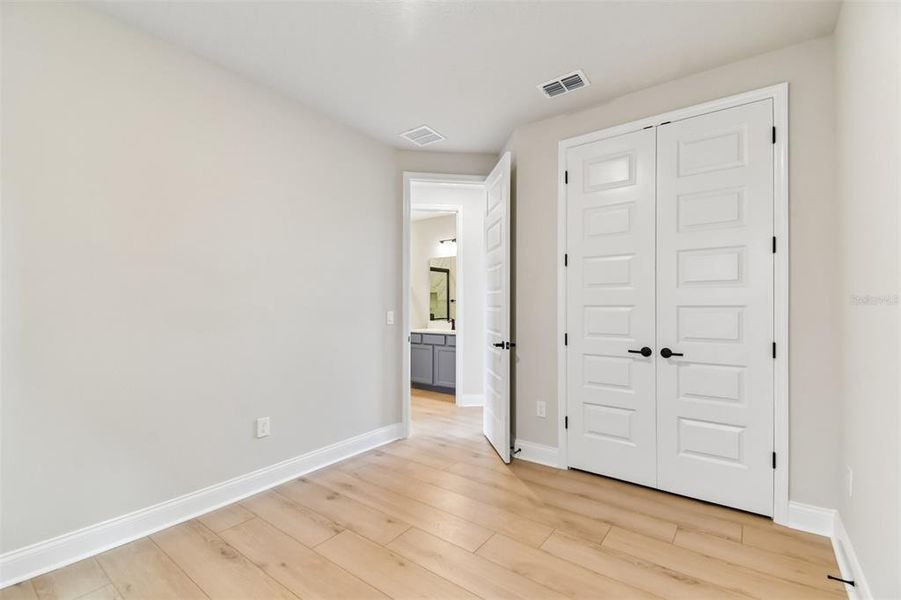 Spacious, unfurnished interior of a new home in Weslyn Park in Sunbridge 34', St. Cloud (Image 24).