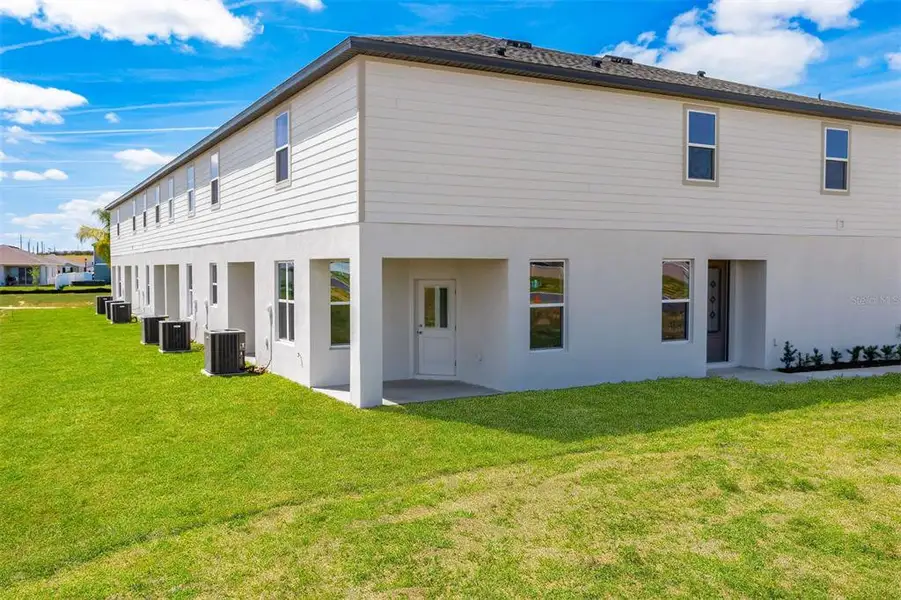 Exterior details and patio area of a home in Sol Vista, Dundee (Image 3).