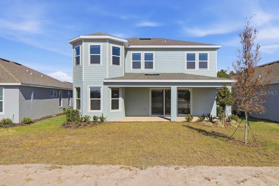 Exterior details and patio area of a home in Center Lake Ranch Community Group Page, St. Cloud (Image 3).