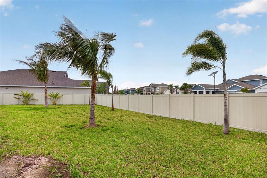Exterior details and patio area of a home in Seaire, Parrish (Image 35).