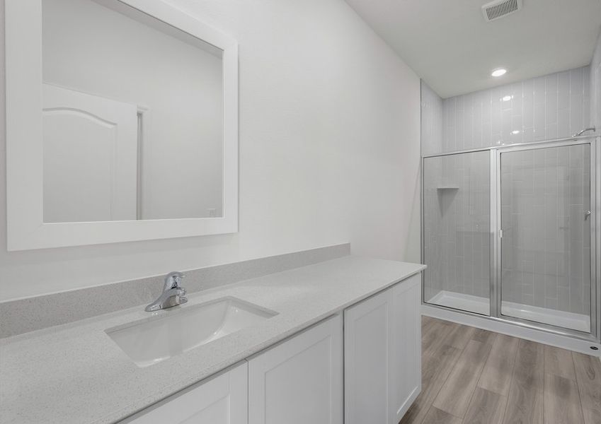 The master bathroom features this stunning large vanity and glass door enclosed shower! The master bathroom features this stunning large vanity and glass door enclosed shower!