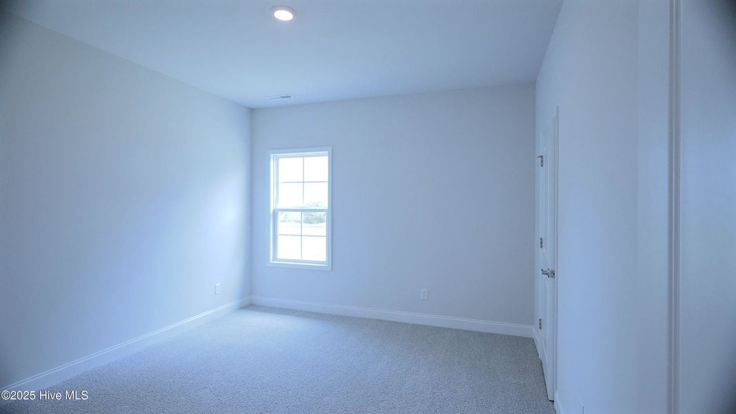 Spacious, unfurnished interior of a new home in Palmetto Creek, Bolivia (Image 15).