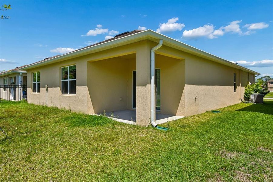 Exterior details and patio area of a home in Riviera Bella, Debary (Image 31).