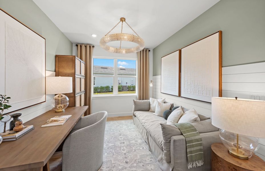 Representative furnished interior of a home built from the Palmary by DiVosta in BeachWalk by Manasota Key, Englewood (Image 18).