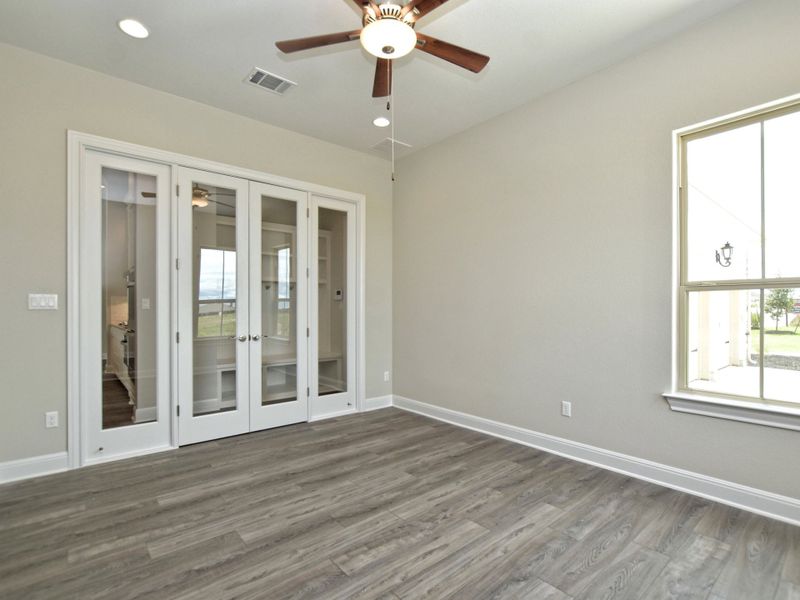 Representative unfurnished interior of a home built from the Siena III by Giddens Homes in Clearwater Ranch, Liberty Hill (Image 208).