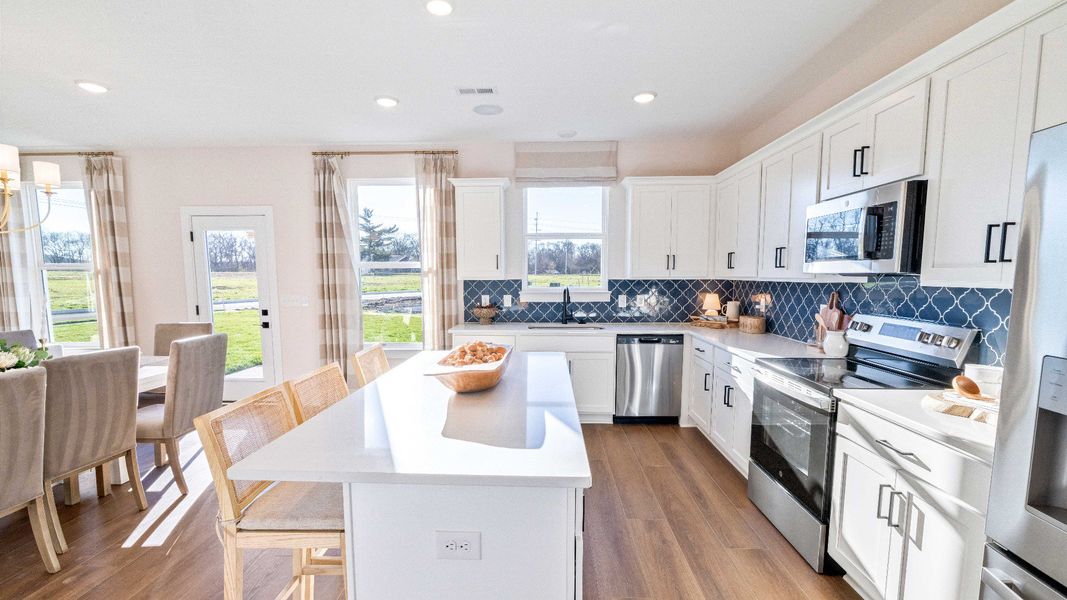 Representative furnished interior of a home built from the Bedford by DRB Homes in Cottages of Bearwood, Mount Pleasant (Image 9).