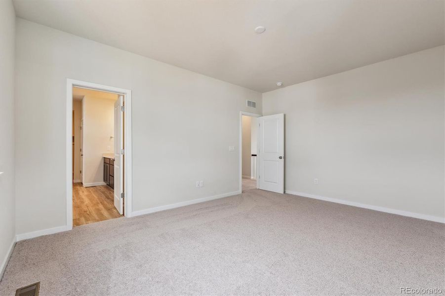 Spacious, unfurnished interior of a new home in Floret Collection at Parkdale Commons, Lafayette (Image 27).