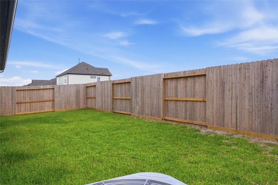 Exterior details and patio area of a home in , Alvin (Image 20). Exterior details and patio area of a home in , Alvin (Image 20).