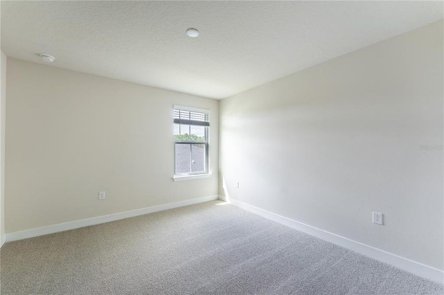 Spacious, unfurnished interior of a new home in The Palms at Venetian Bay, New Smyrna Beach (Image 21). Spacious, unfurnished interior of a new home in The Palms at Venetian Bay, New Smyrna Beach (Image 21).