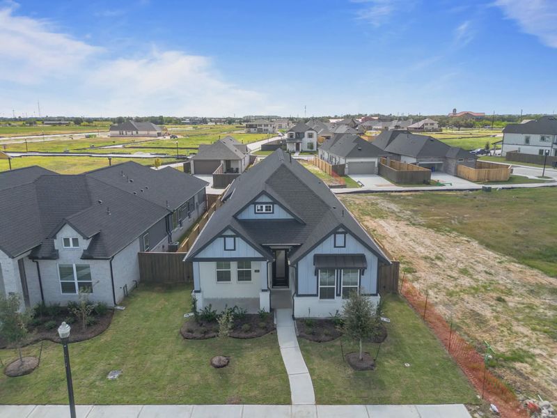Image 34 representing the Augusta by Chesmar Homes in Riceland Alley Loads, Mont Belvieu, TX.