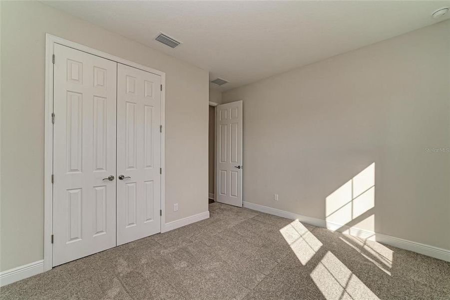 Spacious, unfurnished interior of a new home in Pasadena Woods, Wesley Chapel (Image 31).