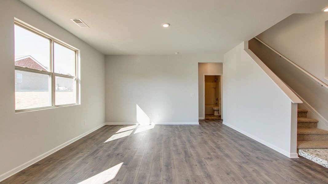 Spacious, unfurnished interior of a new home in The Parks, White House (Image 20).