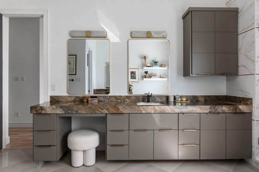 A closer look at the dual vanity area, offering ample storage, a dedicated make a vanity, and a polished design that feels both functional and elevated.