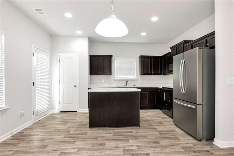 Furnished interior view inside a new home in , Commerce (Image 7).