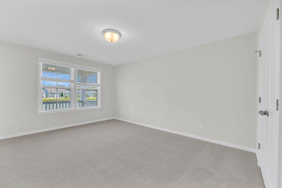 Spacious, unfurnished interior of a new home in Sweetgrass Station, Summerville (Image 14).