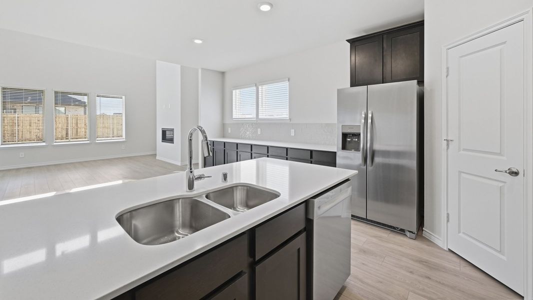 Representative furnished interior of a home built from the Oakridge by D.R. Horton in Morning Ridge, Princeton (Image 8).