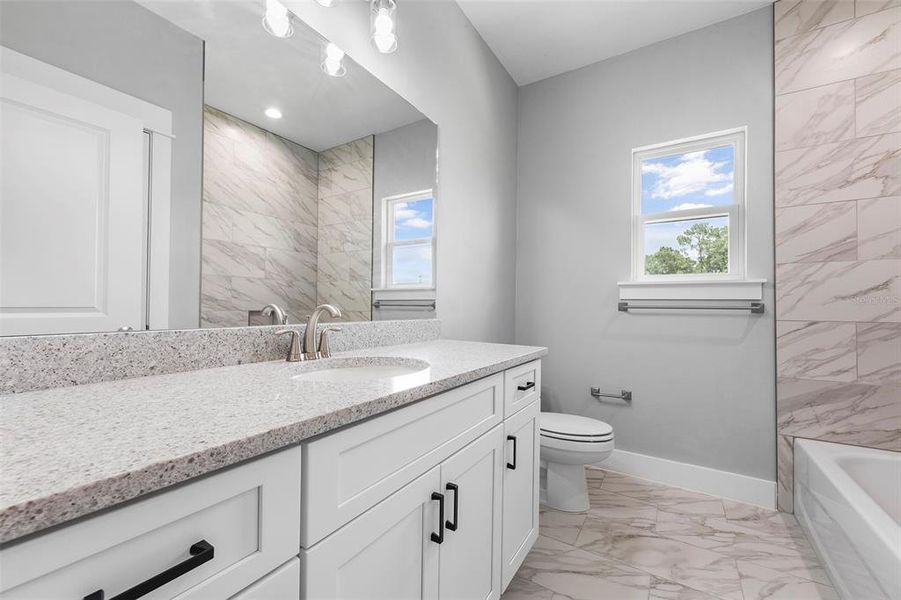 Furnished interior view inside a new home in , Lake City (Image 11).