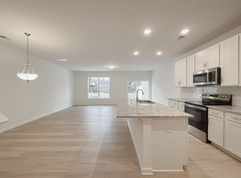 Furnished interior view inside a new home in East Main Townes, Spartanburg (Image 5).