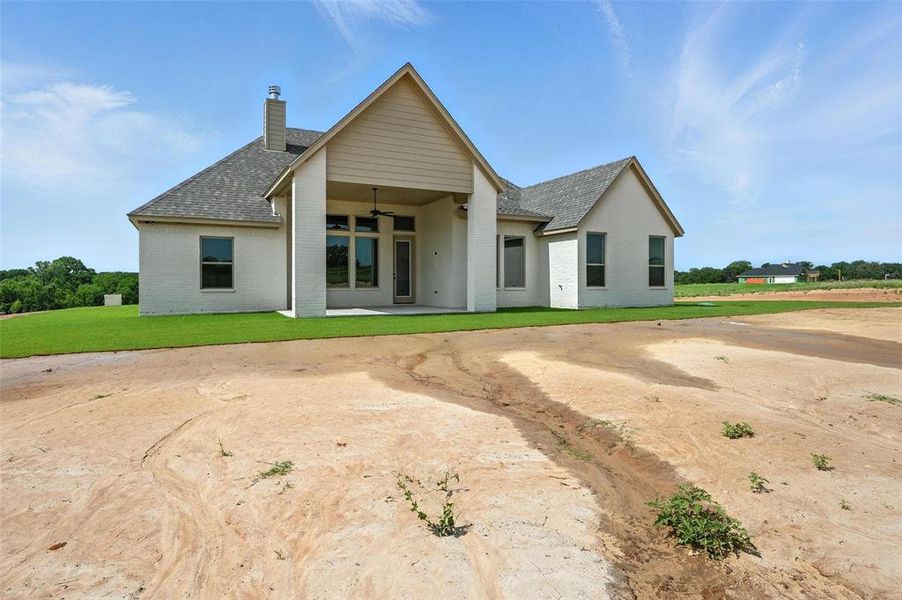 Front exterior of a new home in , Poolville, TX, highlighting curb appeal (Image 1). Front exterior of a new home in , Poolville, TX, highlighting curb appeal (Image 1).