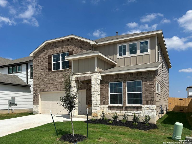 Front exterior of a new home in Enclave at Hennersby Hollow 50's, San Antonio, TX, highlighting curb appeal (Image 1). Front exterior of a new home in Enclave at Hennersby Hollow 50's, San Antonio, TX, highlighting curb appeal (Image 1).
