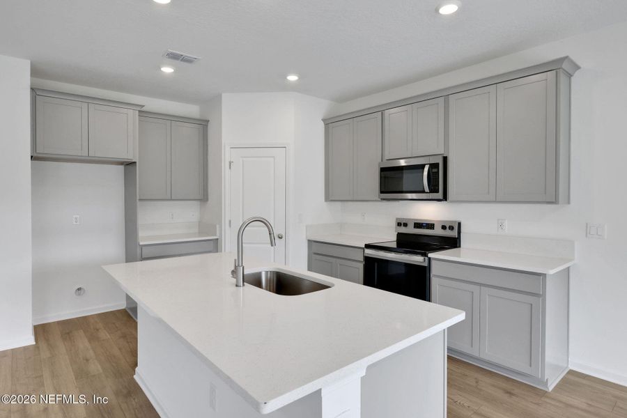 Furnished interior view inside a new home in Amberly, Green Cove Springs (Image 15).