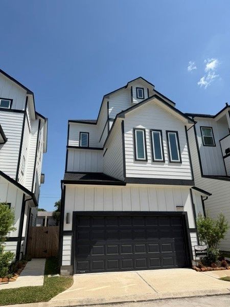 Front exterior of a new home in Regents Court, Houston, TX, highlighting curb appeal (Image 1). Front exterior of a new home in Regents Court, Houston, TX, highlighting curb appeal (Image 1).