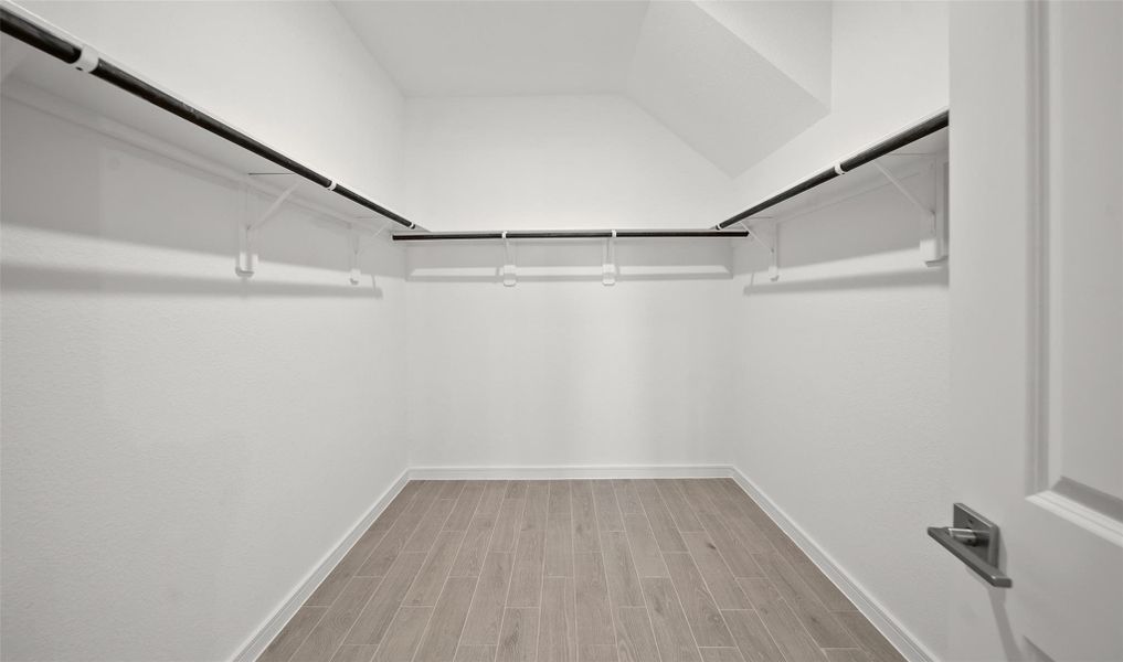 Primary walk-in closet (*Photo not of actual home and used for illustration purposes only.)